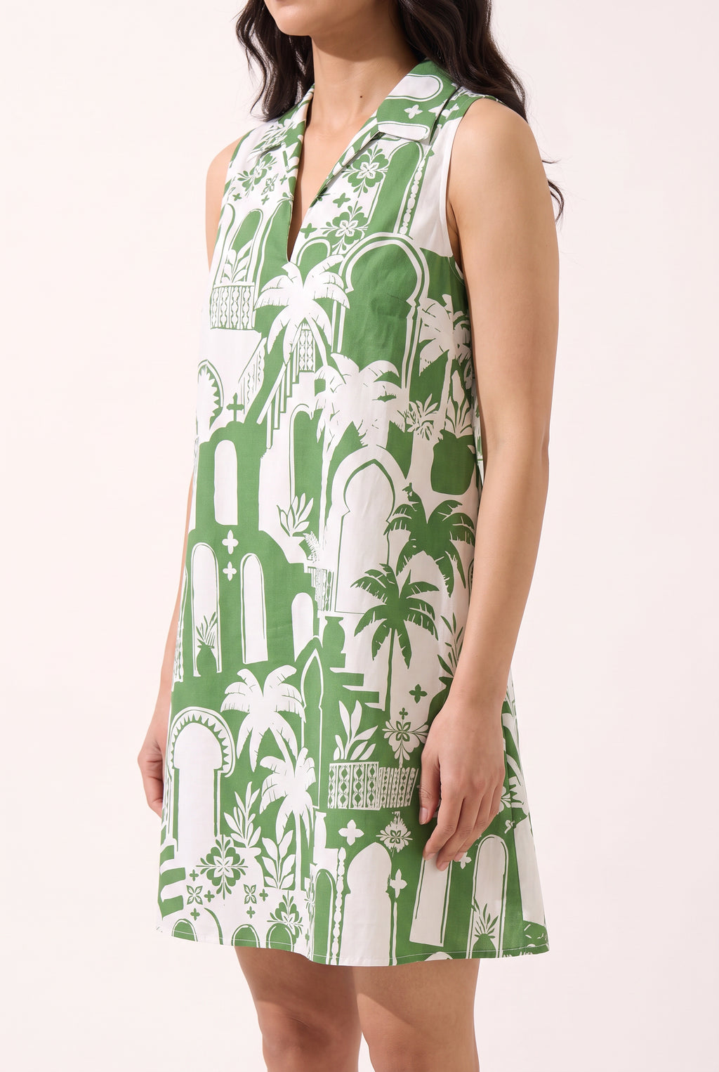 Side view of the Pick Of The Summer Collared Shift Mini Dress showing shift ease and mini length.
