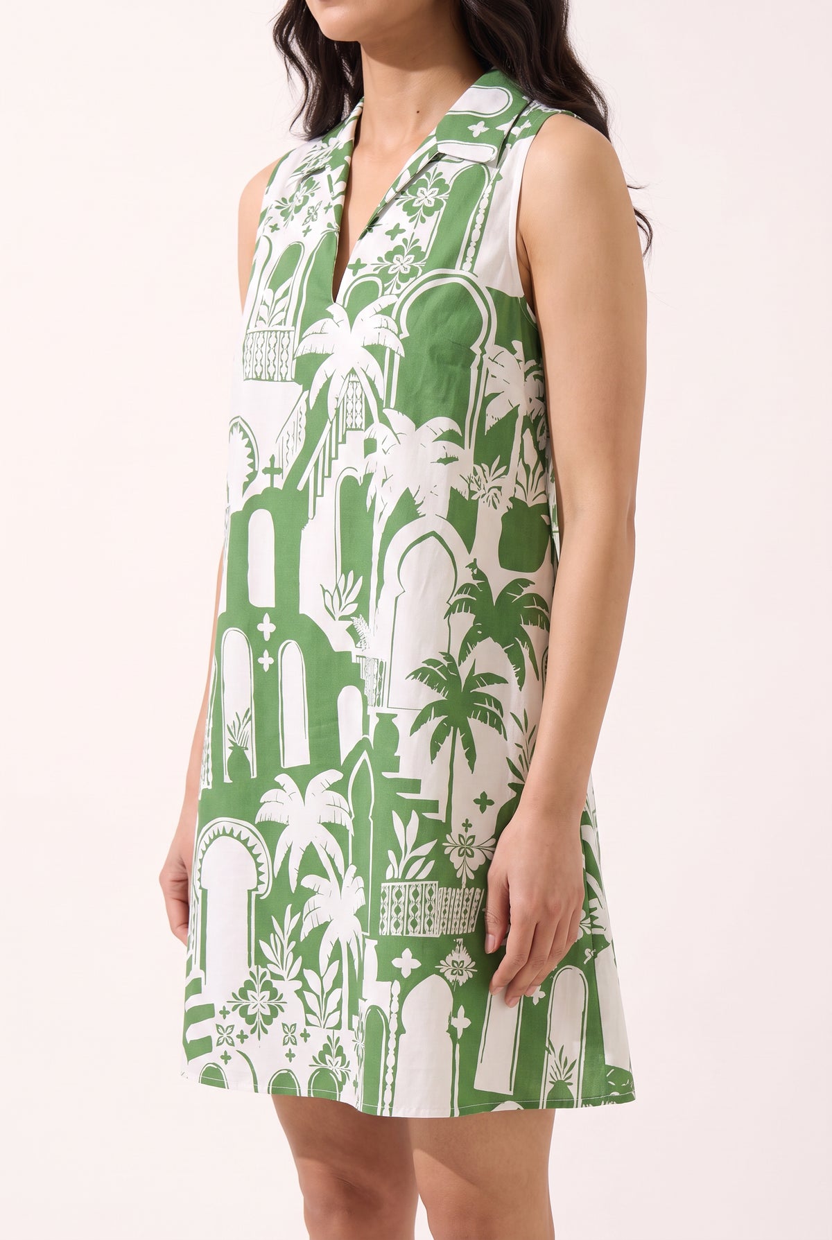Side view of the Pick Of The Summer Collared Shift Mini Dress showing shift ease and mini length.