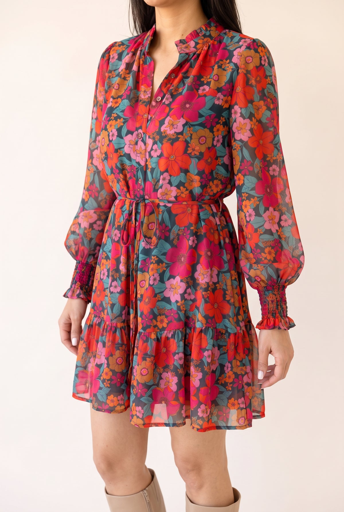 Angled side fit of the Only If You Knew Floral Dress in Small, showing sleeve volume and the tiered hem.