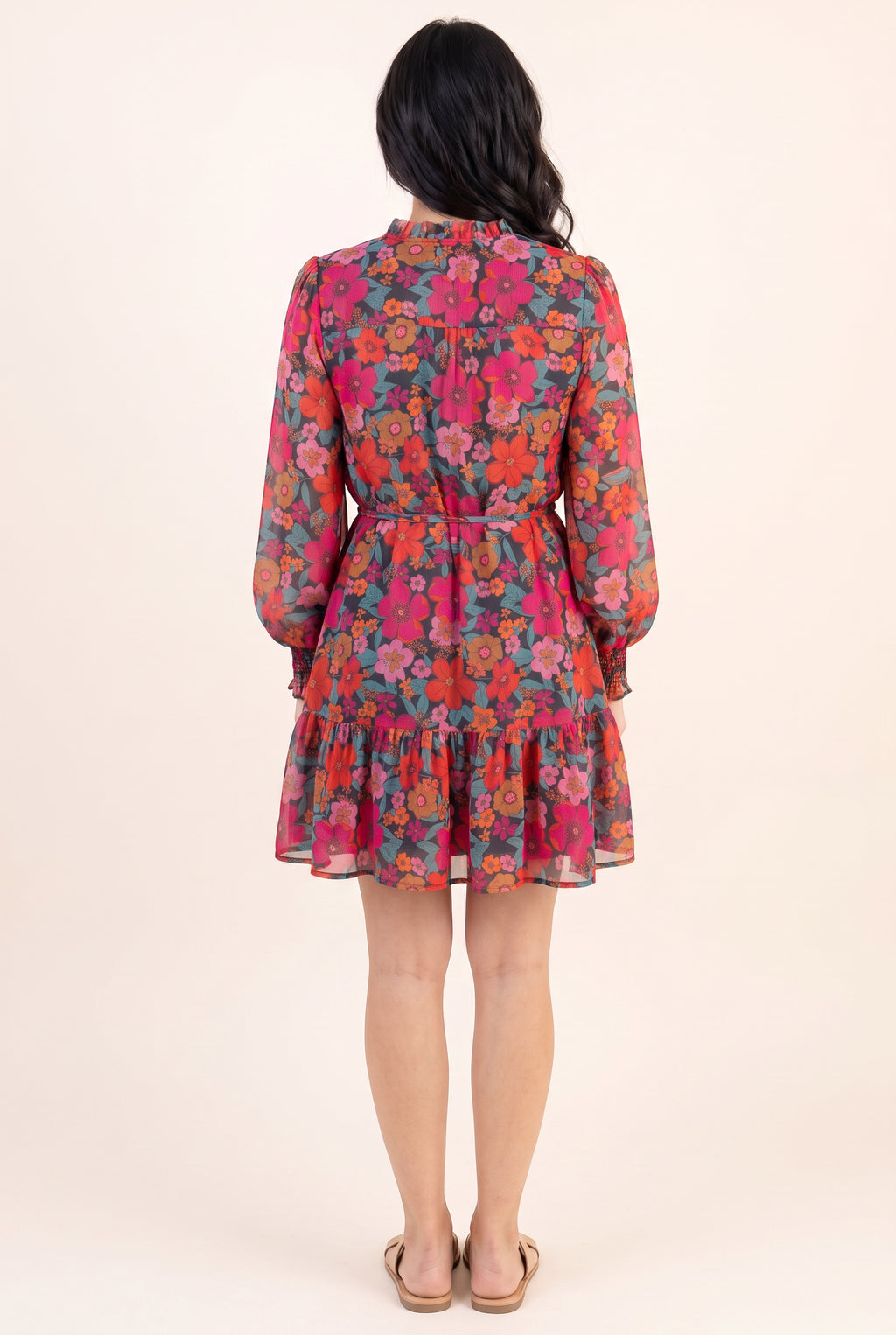 Back of the Only If You Knew Floral Dress in Small, showing the clear collar, yoke, pleat and tied waist.