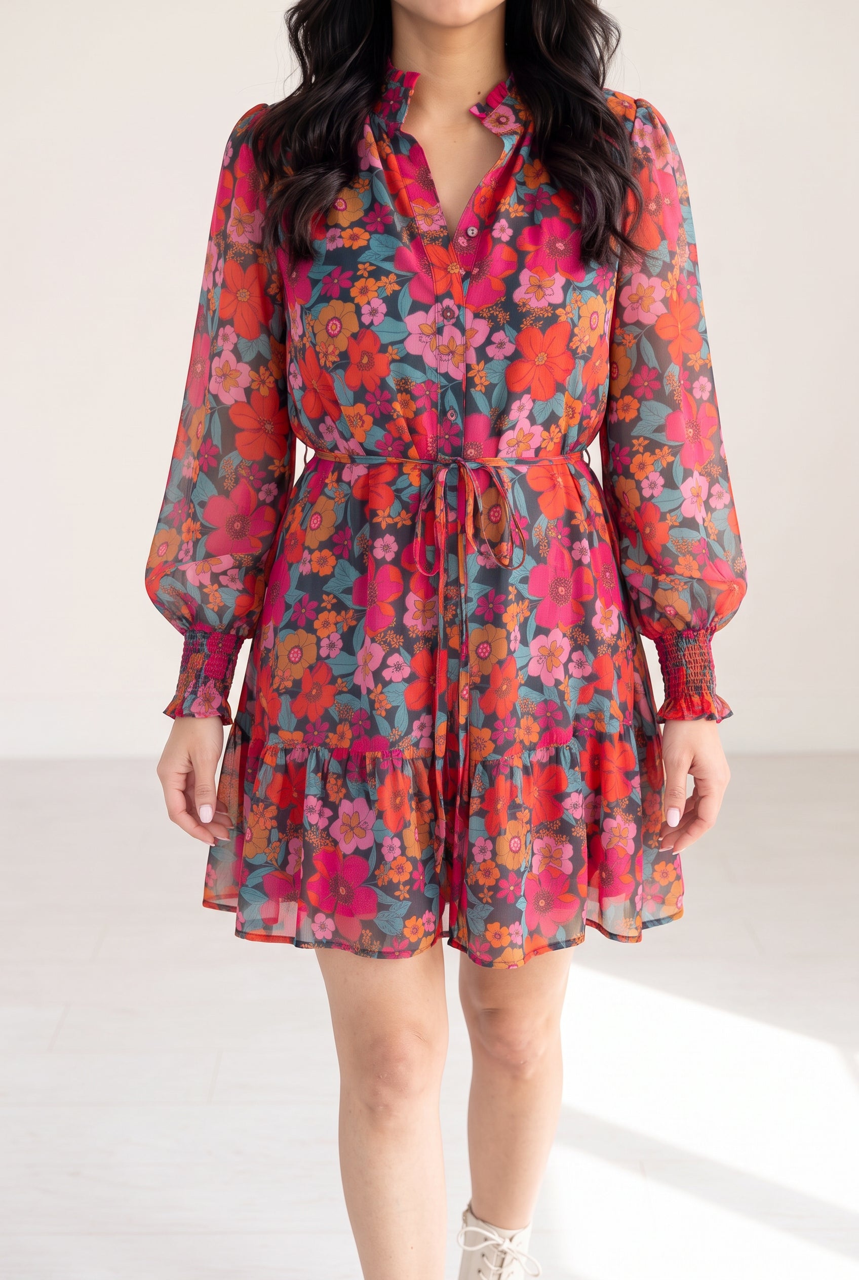 Only If You Knew Floral Dress in Small worn in bright daylight, showing its floral color and lined mini skirt.