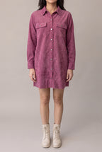 Front view of the Small mauve corduroy shirt dress showing its relaxed mini fit and metal snap placket.