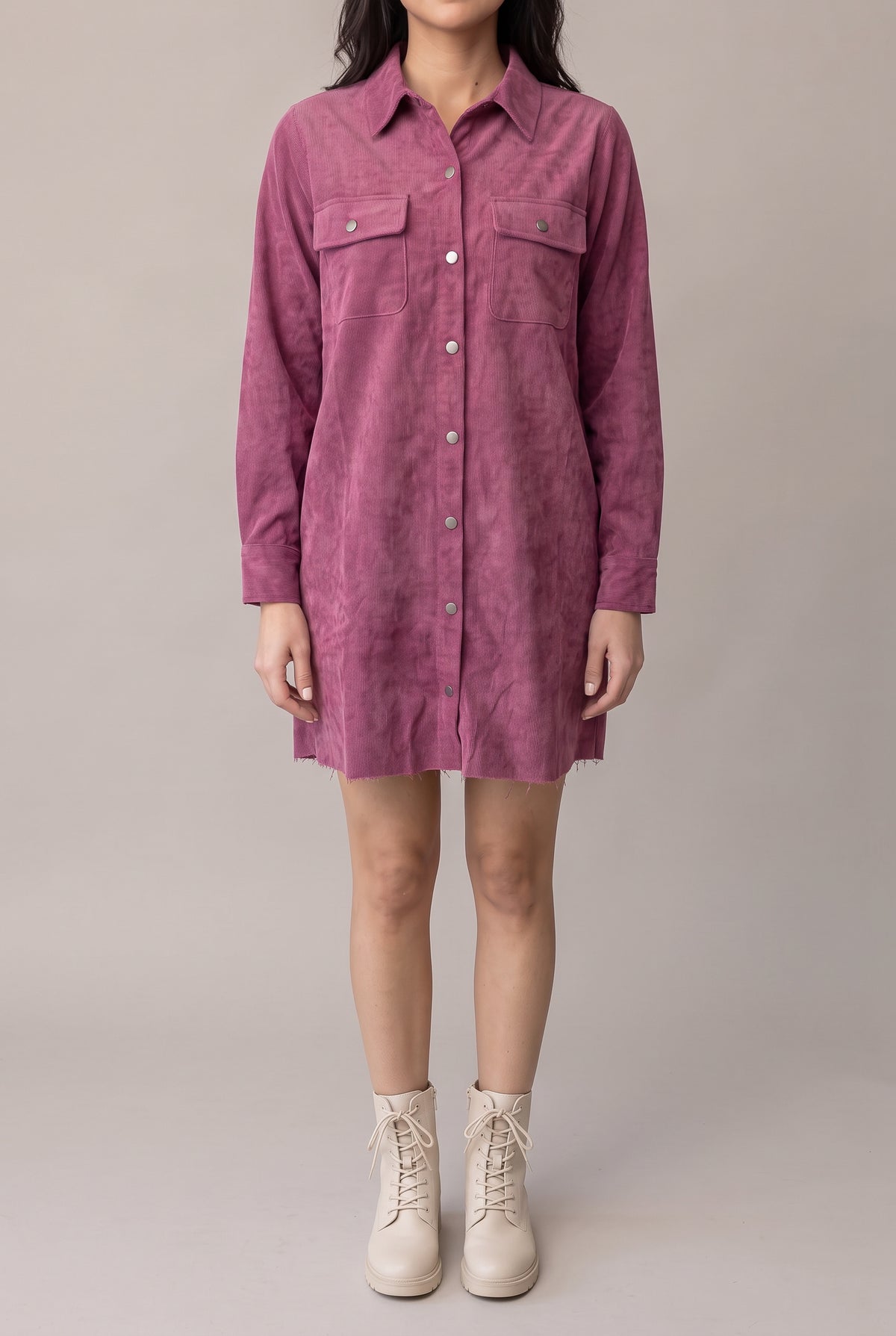 Front view of the Small mauve corduroy shirt dress showing its relaxed mini fit and metal snap placket.