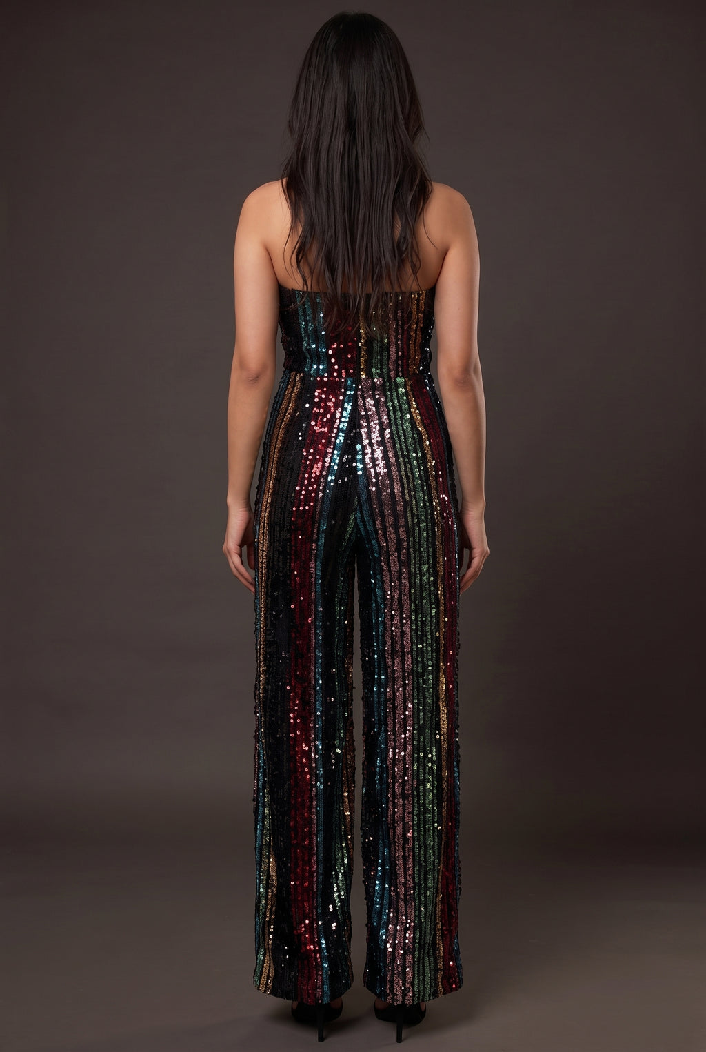 Back fit of the Don't Start Now multicolor sequin jumpsuit in Small on Shweta.