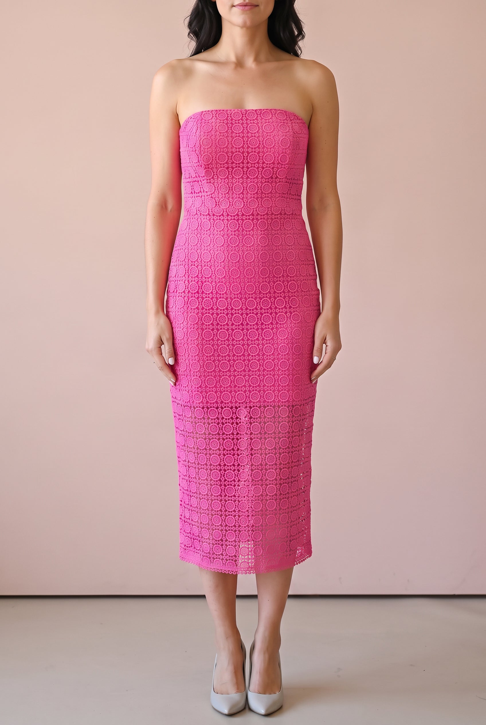 Kiss Me More strapless pink lace midi dress in Small, shown from the front on Shweta.