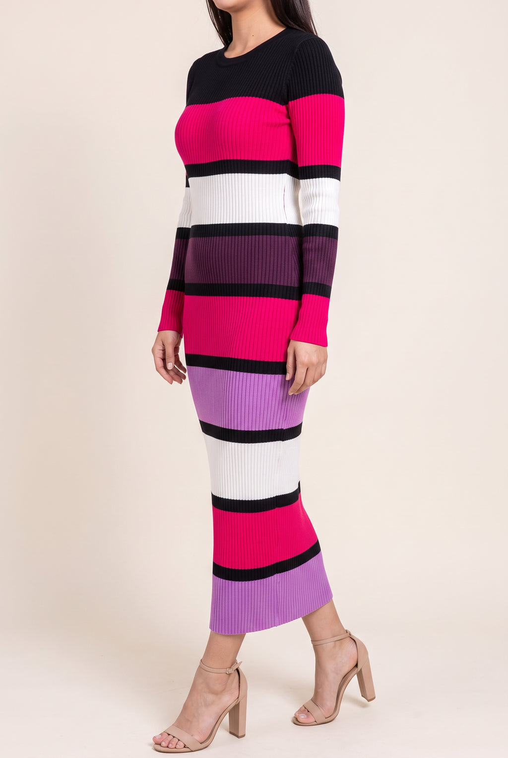 Angled side fit of the color-block sweater dress in Small showing its body-skimming shape.