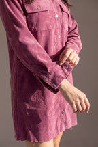 Close detail of the mauve corduroy ribs, washed finish, chest pocket, metal snaps and wide shirt cuff.