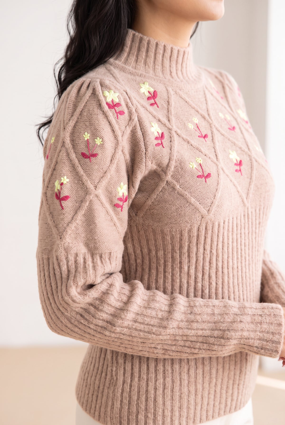 Happy Times Floral Sweater sleeve showing its gathered shoulder, textured upper arm, and ribbed forearm.