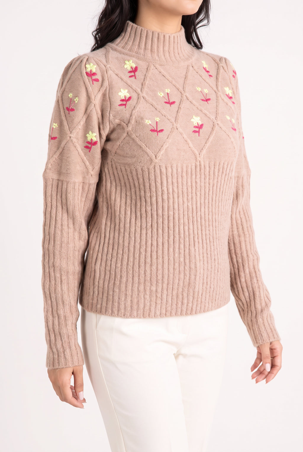 Side view of the Happy Times Floral Sweater showing waist ease and its straight high-hip hem.