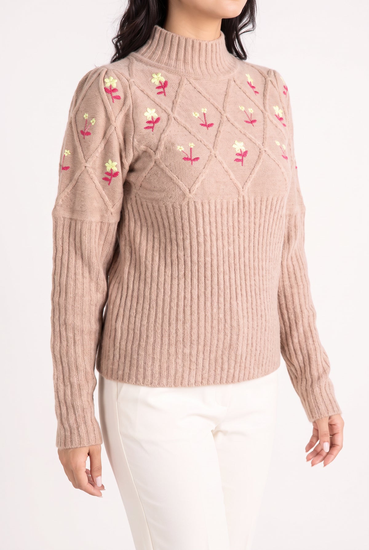 Side view of the Happy Times Floral Sweater showing waist ease and its straight high-hip hem.