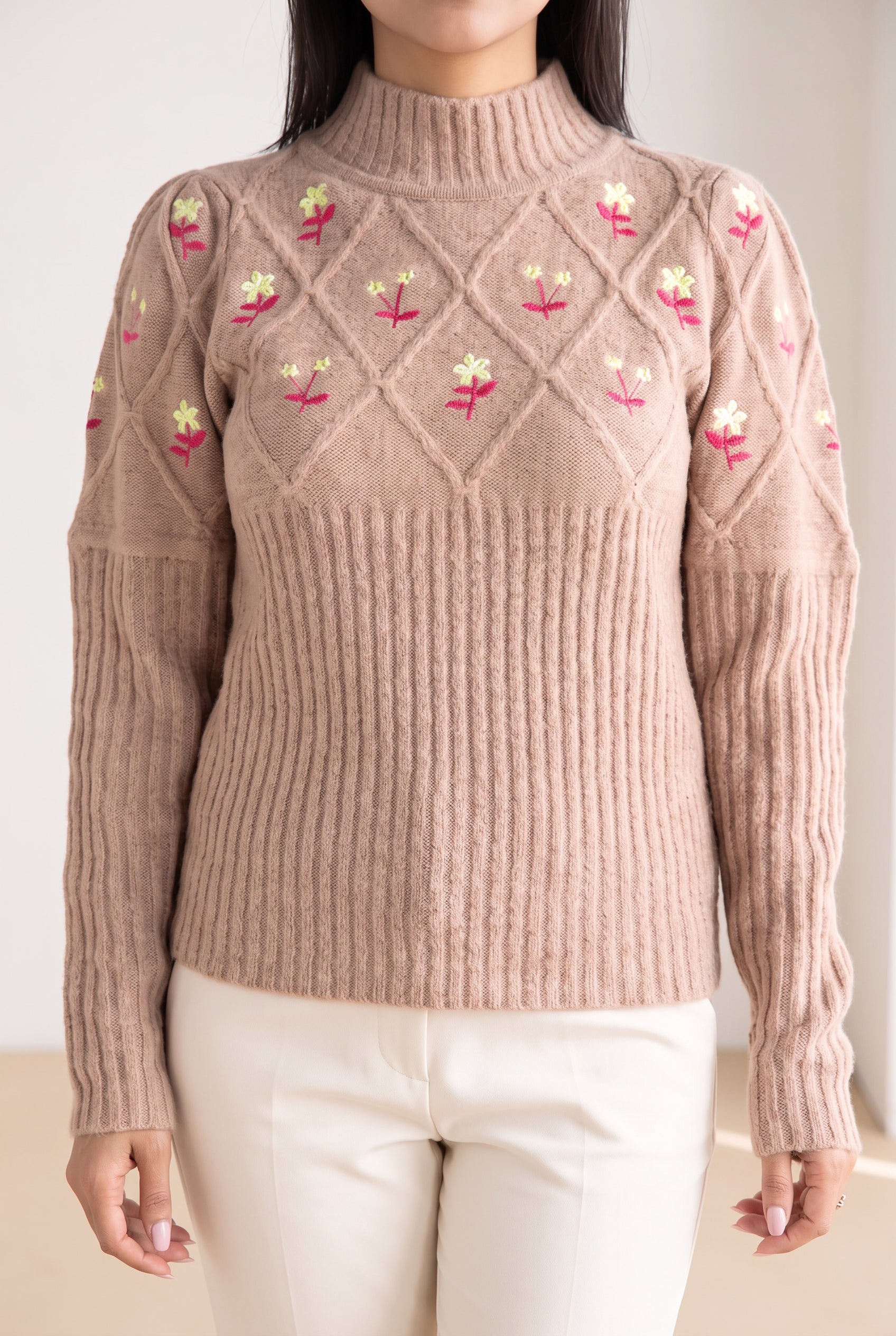 Happy Times Floral Sweater cuffs comparing the resting rib knit with a gently stretched sleeve edge.
