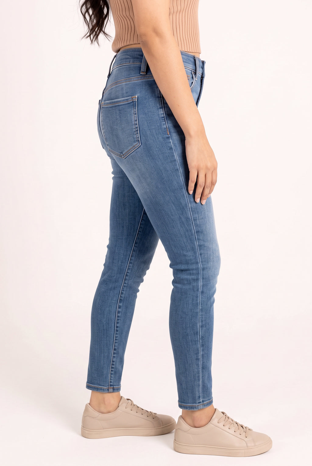 Angled side fit of Bold Adventures Skinny Jeans showing the waist, seat profile and tapered leg.