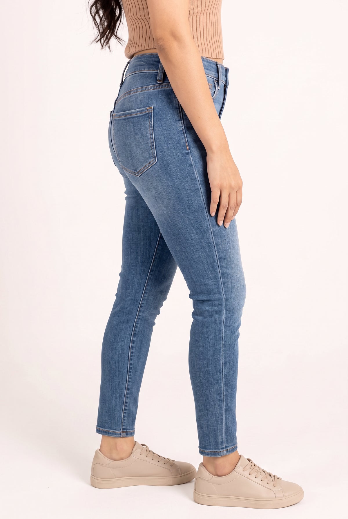 Angled side fit of Bold Adventures Skinny Jeans showing the waist, seat profile and tapered leg.