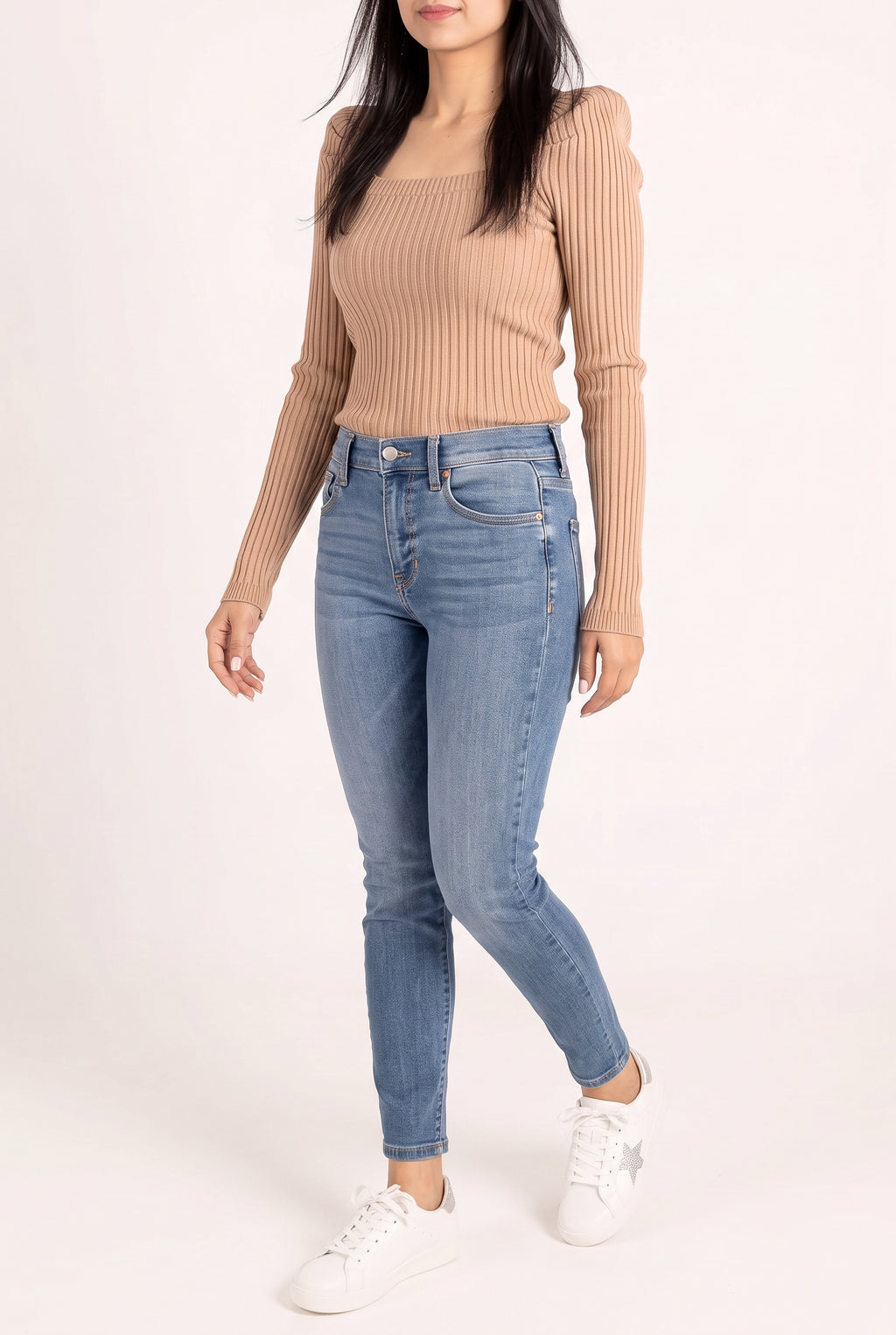 Bold Adventures Skinny Jeans worn mid-stride, showing the fitted legs during natural walking.
