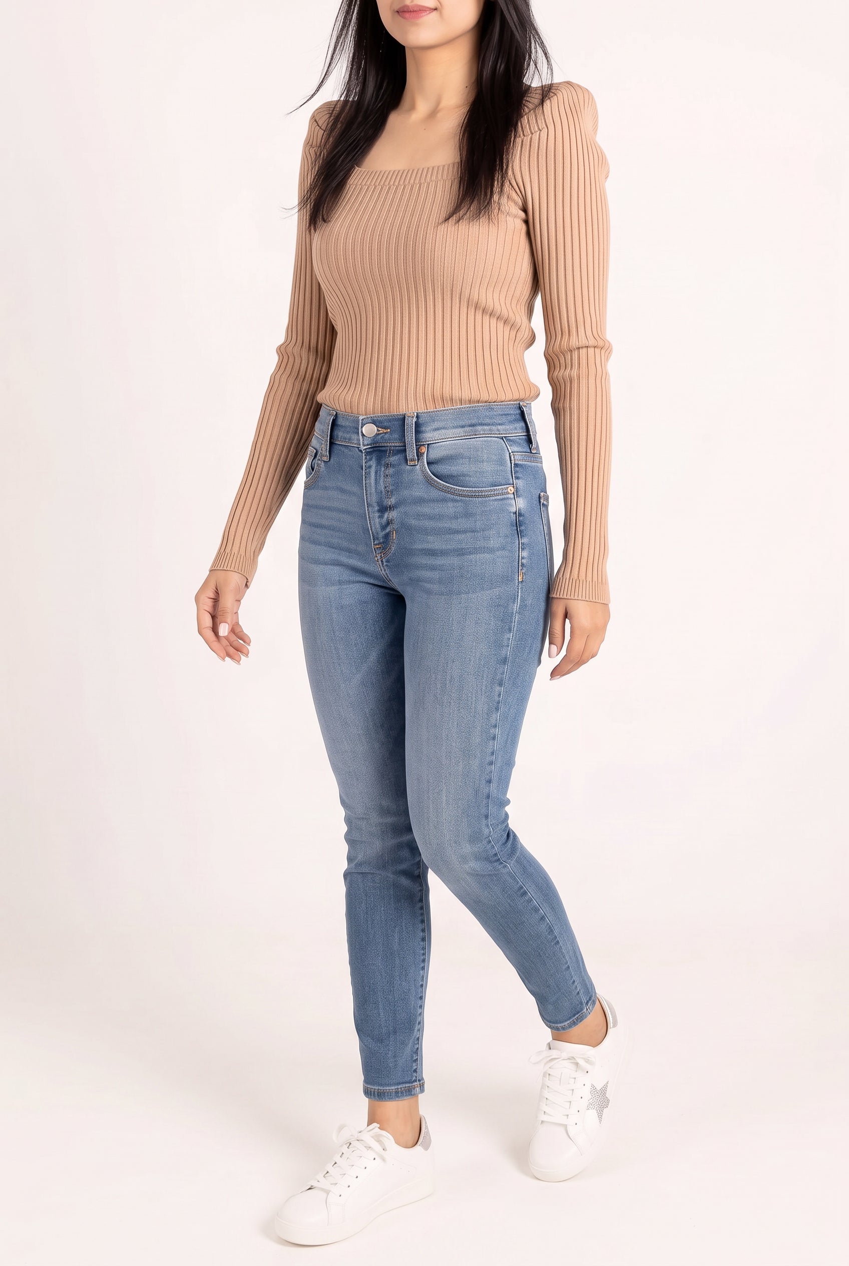 Bold Adventures Skinny Jeans worn mid-stride, showing the fitted legs during natural walking.