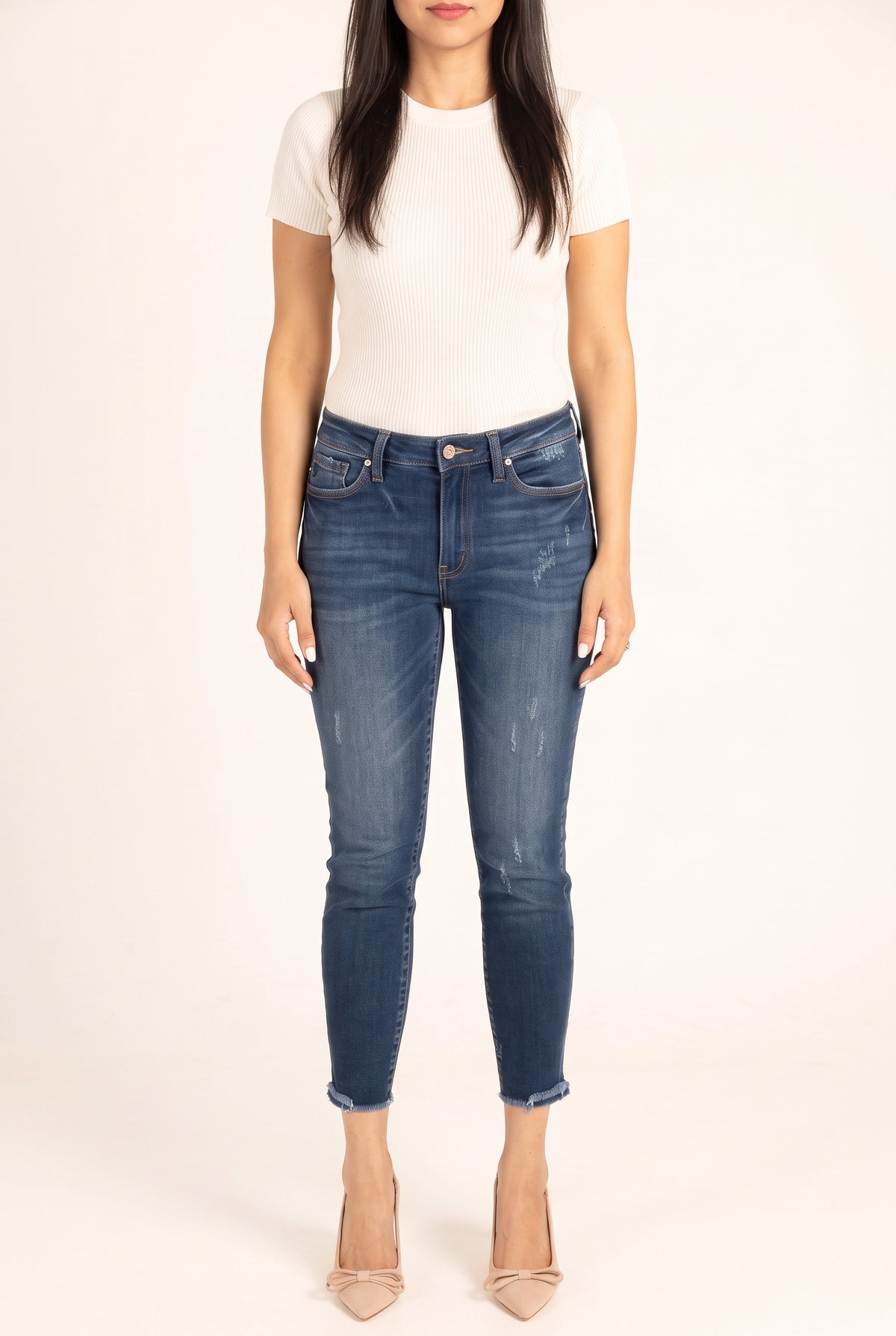 Beautiful Day Mid Rise Ankle Jeans on Shweta showing the front skinny fit, rise and cropped hems.