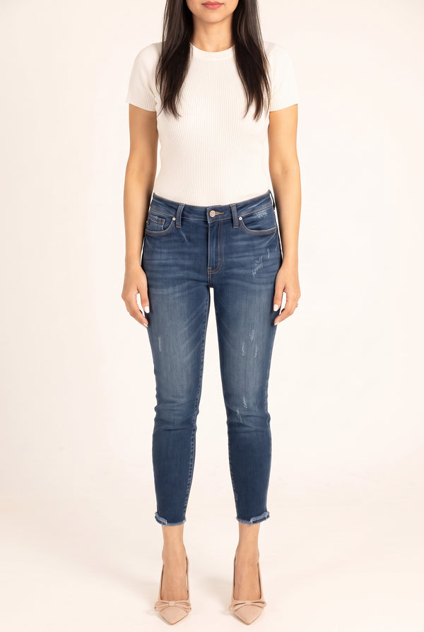 Beautiful Day Mid Rise Ankle Jeans on Shweta showing the front skinny fit, rise and cropped hems.