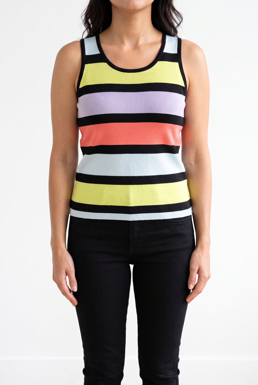 Calm Down Striped Tank Top styled untucked with tailored black trousers in a bright studio.