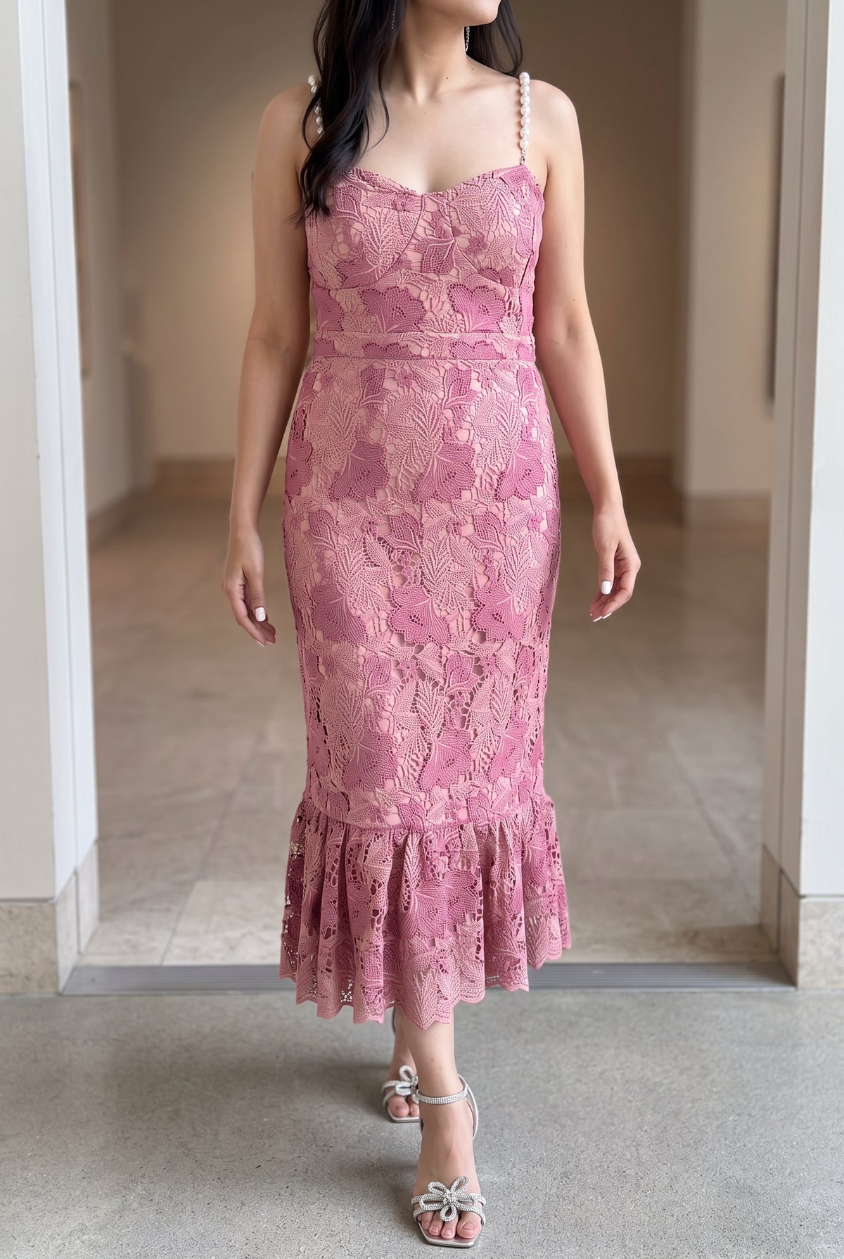 Pink pearl-trim mermaid midi dress worn on arrival at a contemporary gallery.