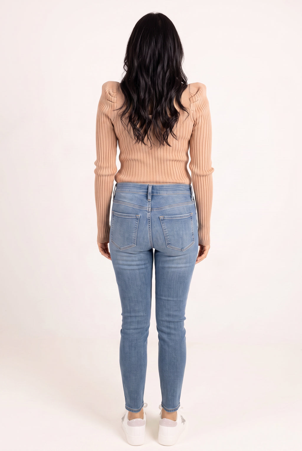 Back fit of Bold Adventures Skinny Jeans showing the shaped yoke, patch pockets and tapered legs.