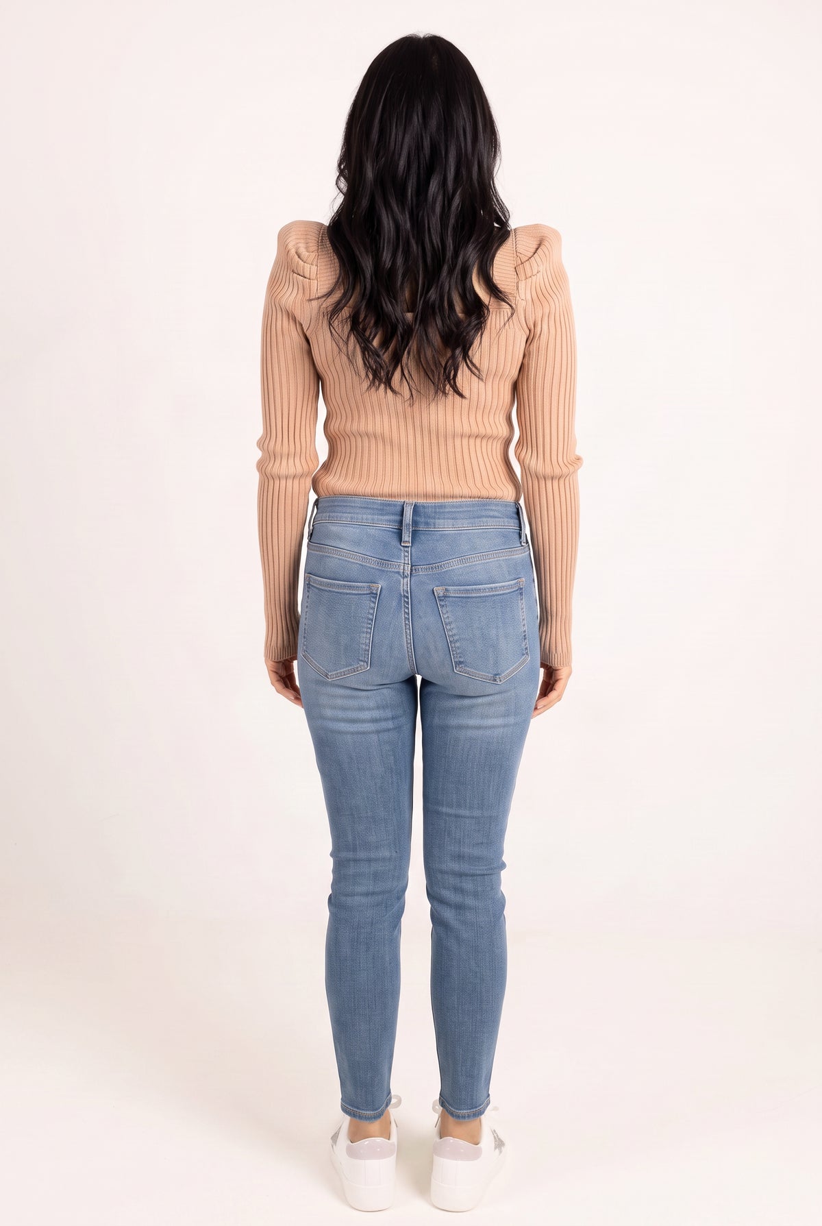 Back fit of Bold Adventures Skinny Jeans showing the shaped yoke, patch pockets and tapered legs.