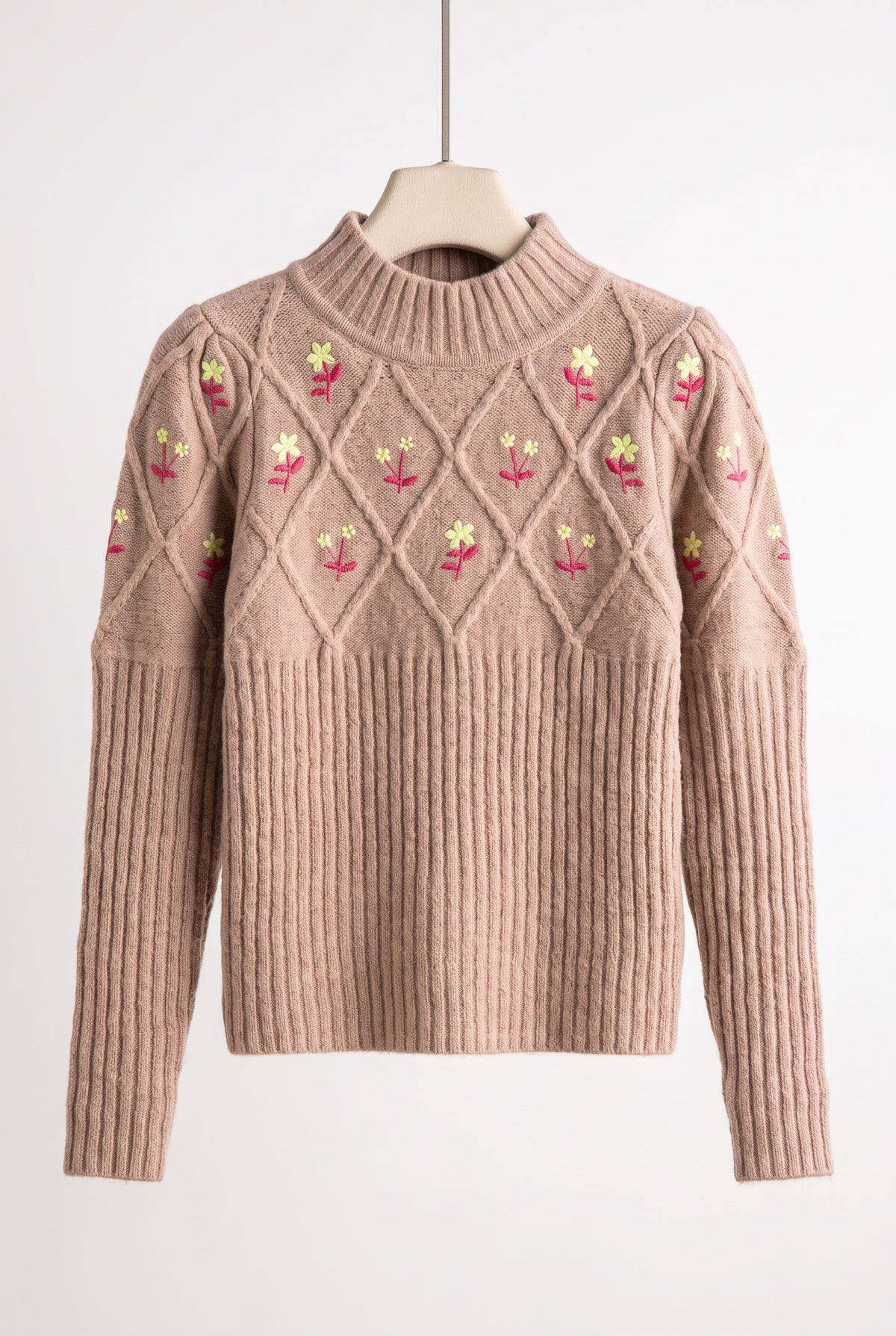 Happy Times Floral Sweater off body showing its natural shape, sleeve length, and straight hem.