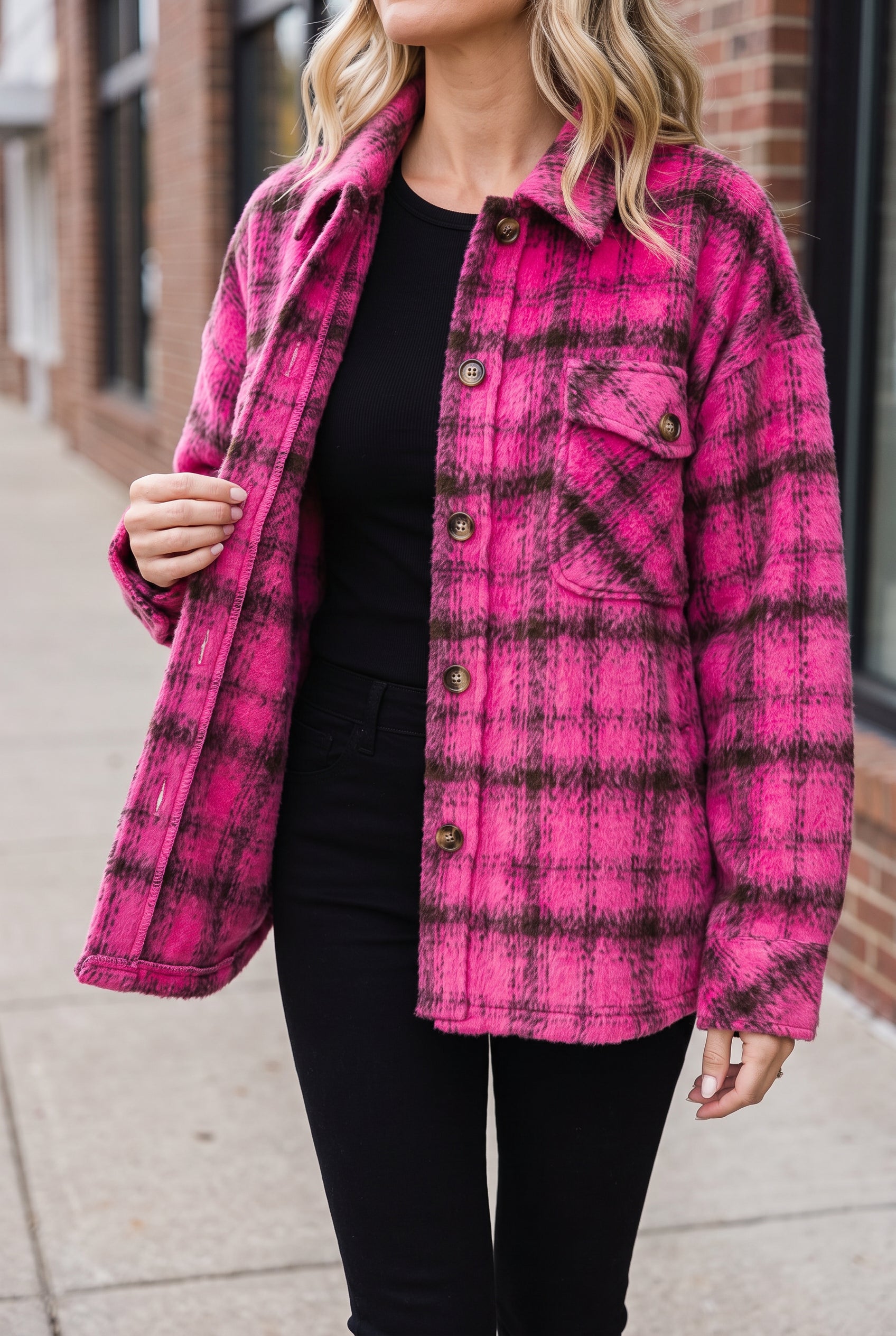 Open Berry Blessed Plaid Shacket showing a limited glimpse of the inner fabric edge.