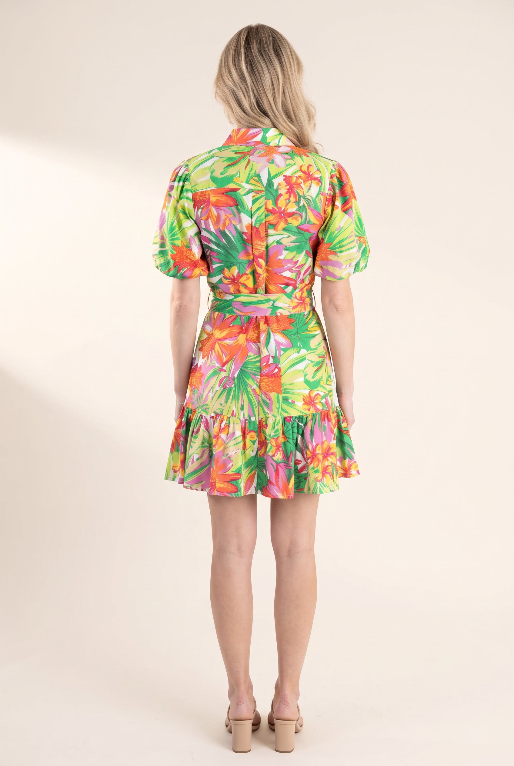 Back fit of the Chase Your Own Sunshine floral dress showing its yoke, sash and ruffle hem.