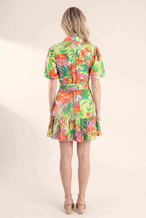 Back fit of the Chase Your Own Sunshine floral dress showing its yoke, sash and ruffle hem.