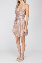 Angled side view of the Cheap Thrills Mini Dress showing its waist depth, skirt flare and mini hem.