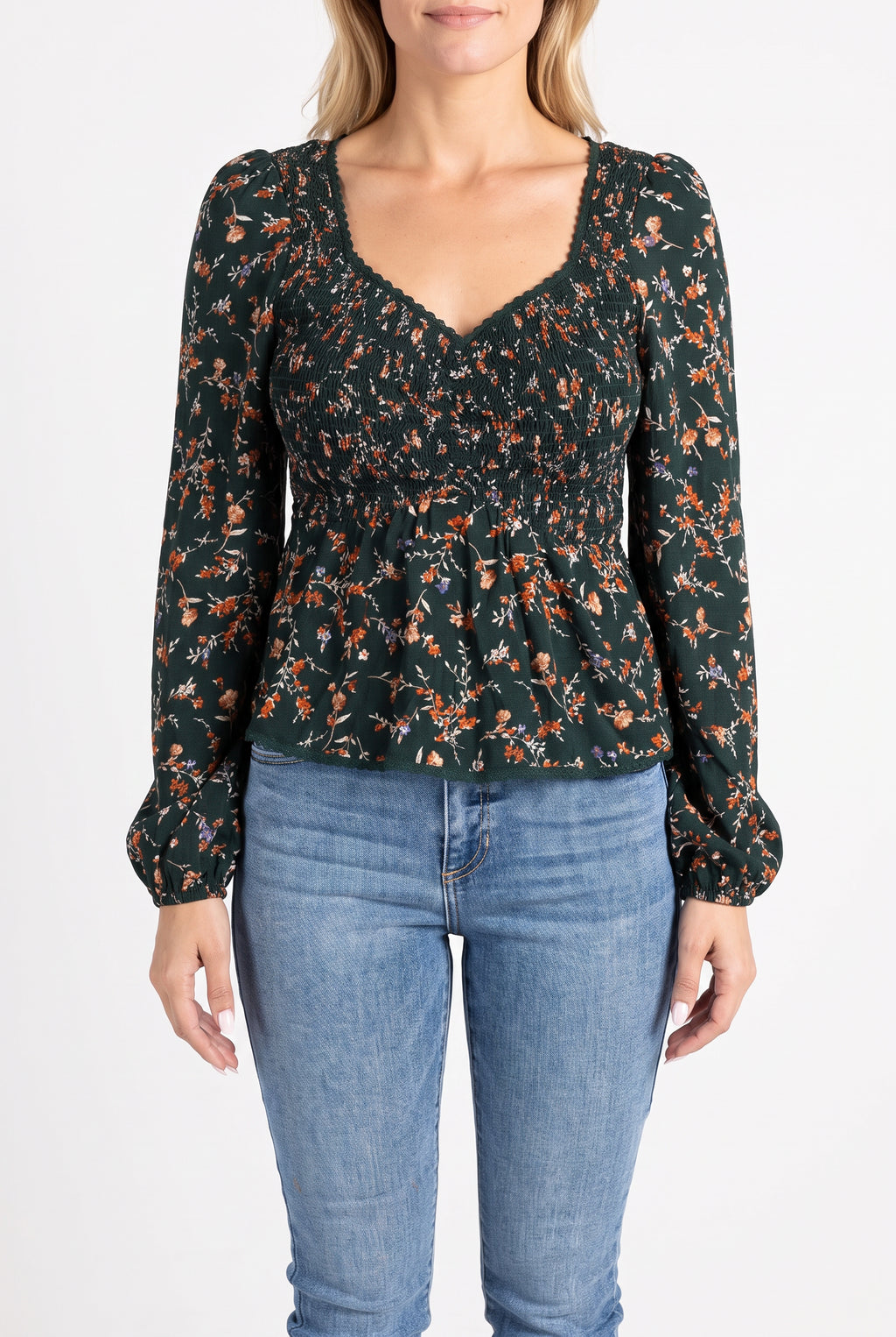 Front fit of the Don't Give Up floral top showing its sweetheart neckline, sleeves and peplum hem.