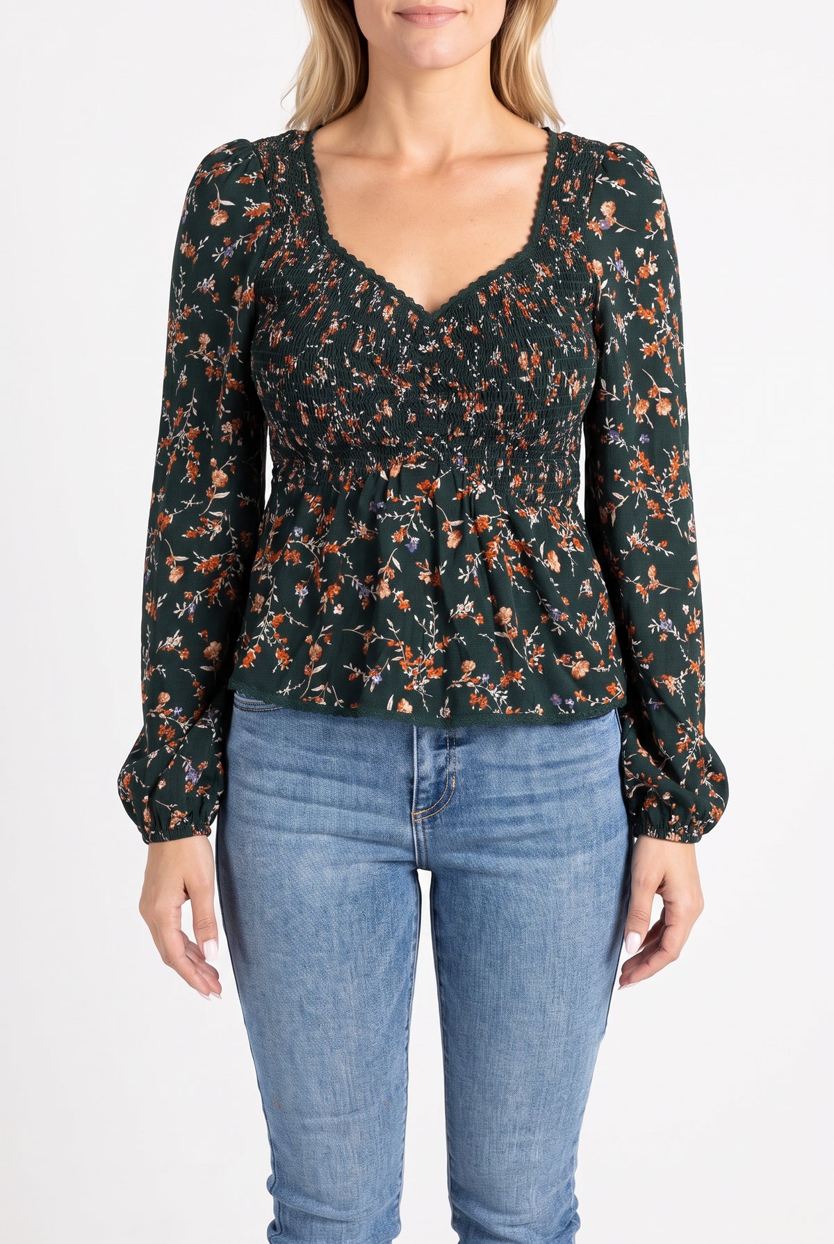Front fit of the Don't Give Up floral top showing its sweetheart neckline, sleeves and peplum hem.
