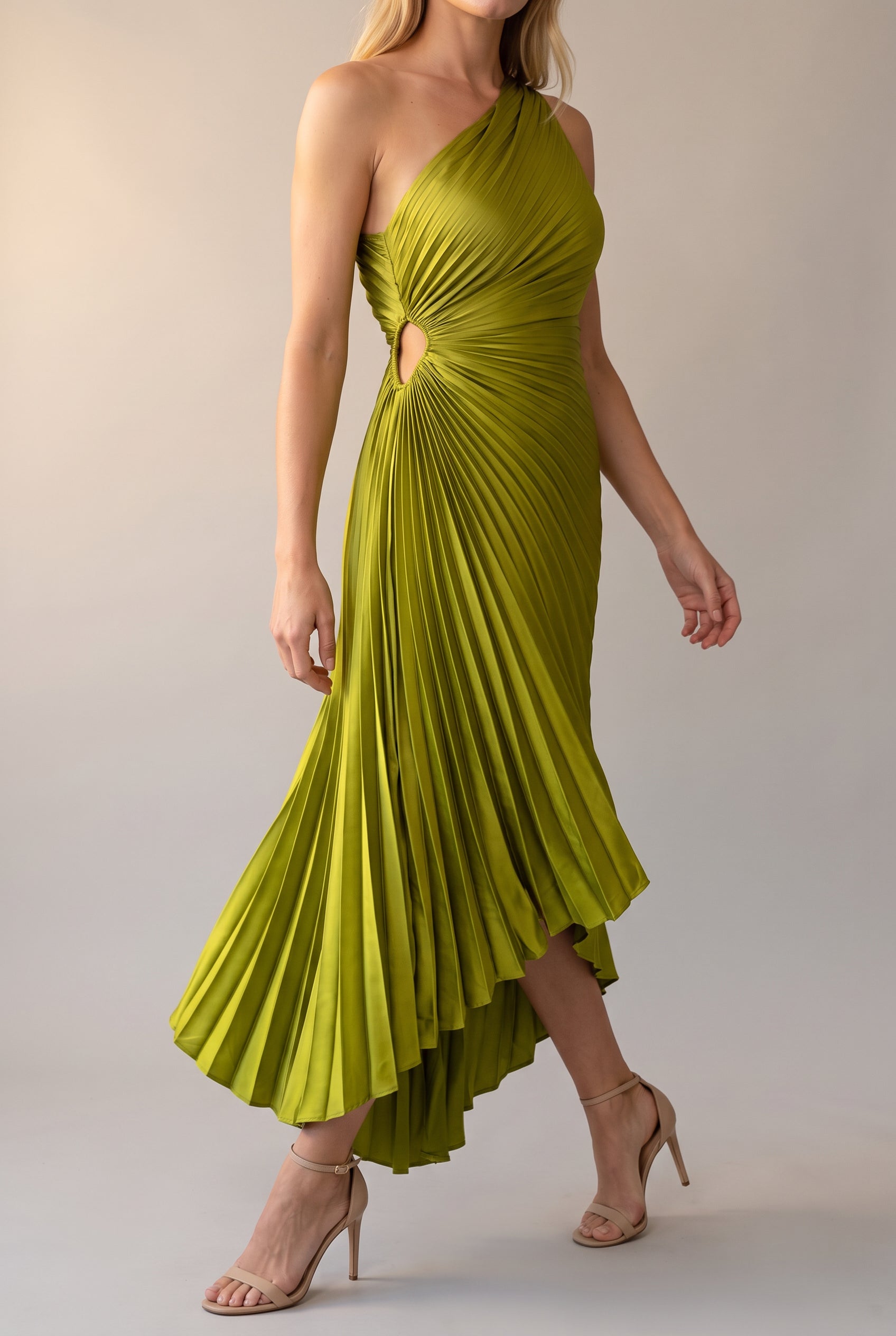 Crazy for You Pleated Maxi Dress worn by Elsa in an evening setting with the pleated skirt in motion.