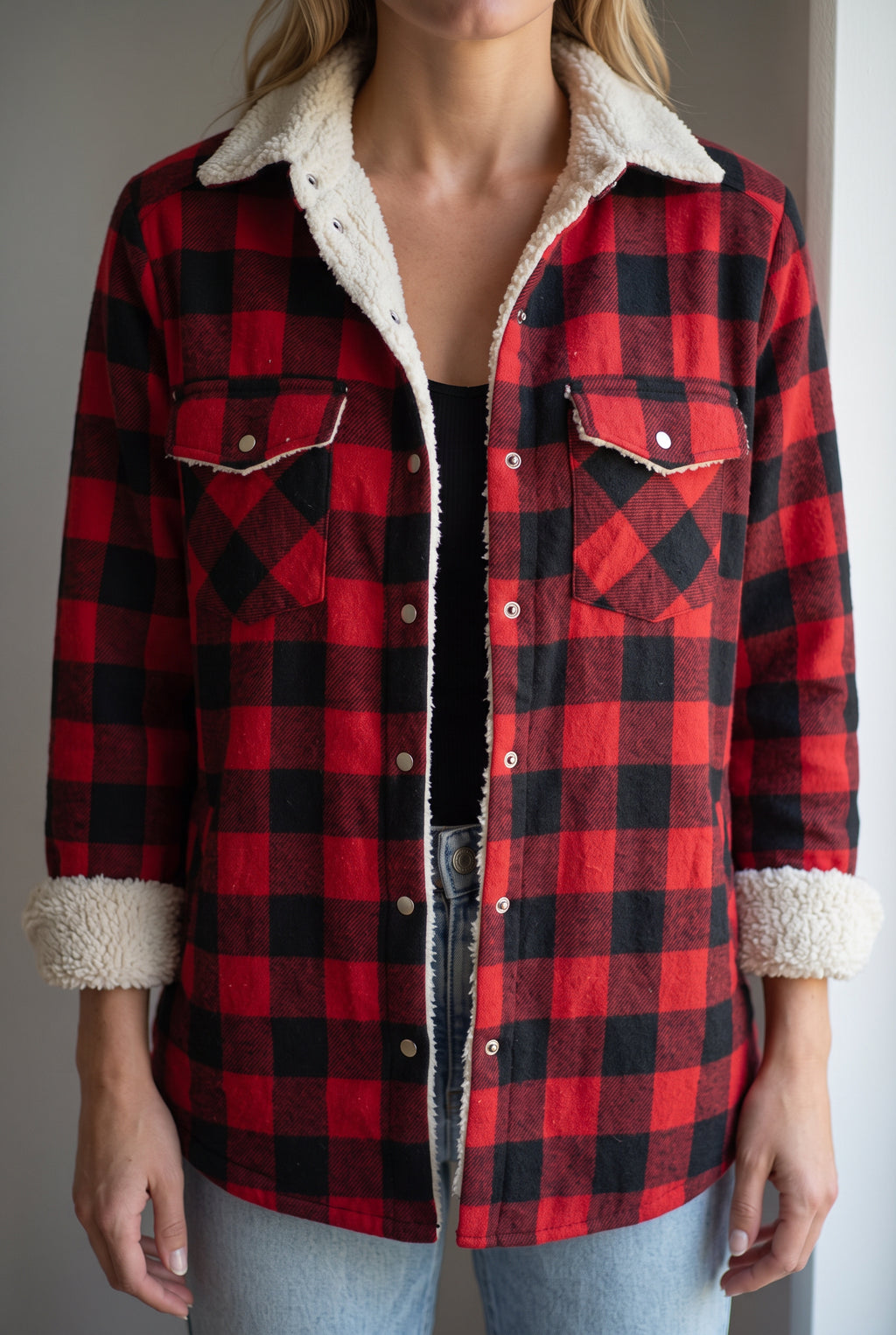 Sherpa trim, buffalo plaid, chest pocket flap and metal snap details on the Cozy Cabin Shacket.