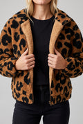 Going Wild leopard jacket held open to show its interior finish and lower-front pocket areas.