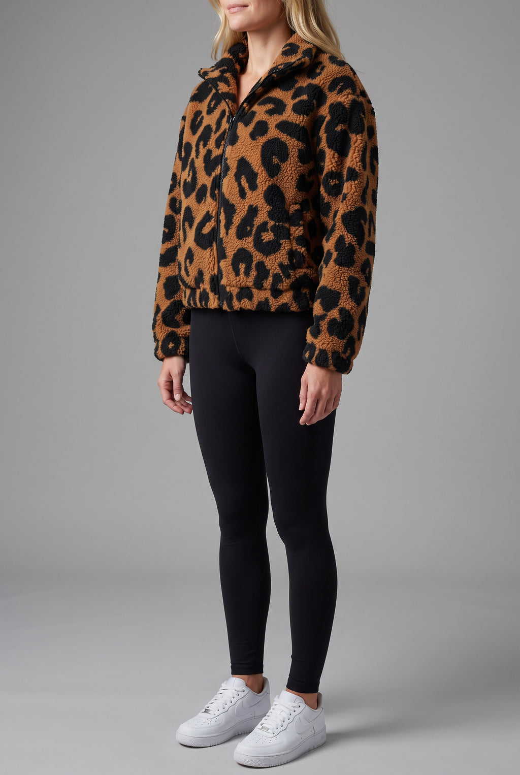 Side fit of the Going Wild leopard jacket in Small on Elsa, showing sleeve volume and hem depth.