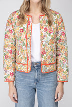 Open front of the Good Feeling Cotton Jacket showing its buttons, orange binding and patch pockets.