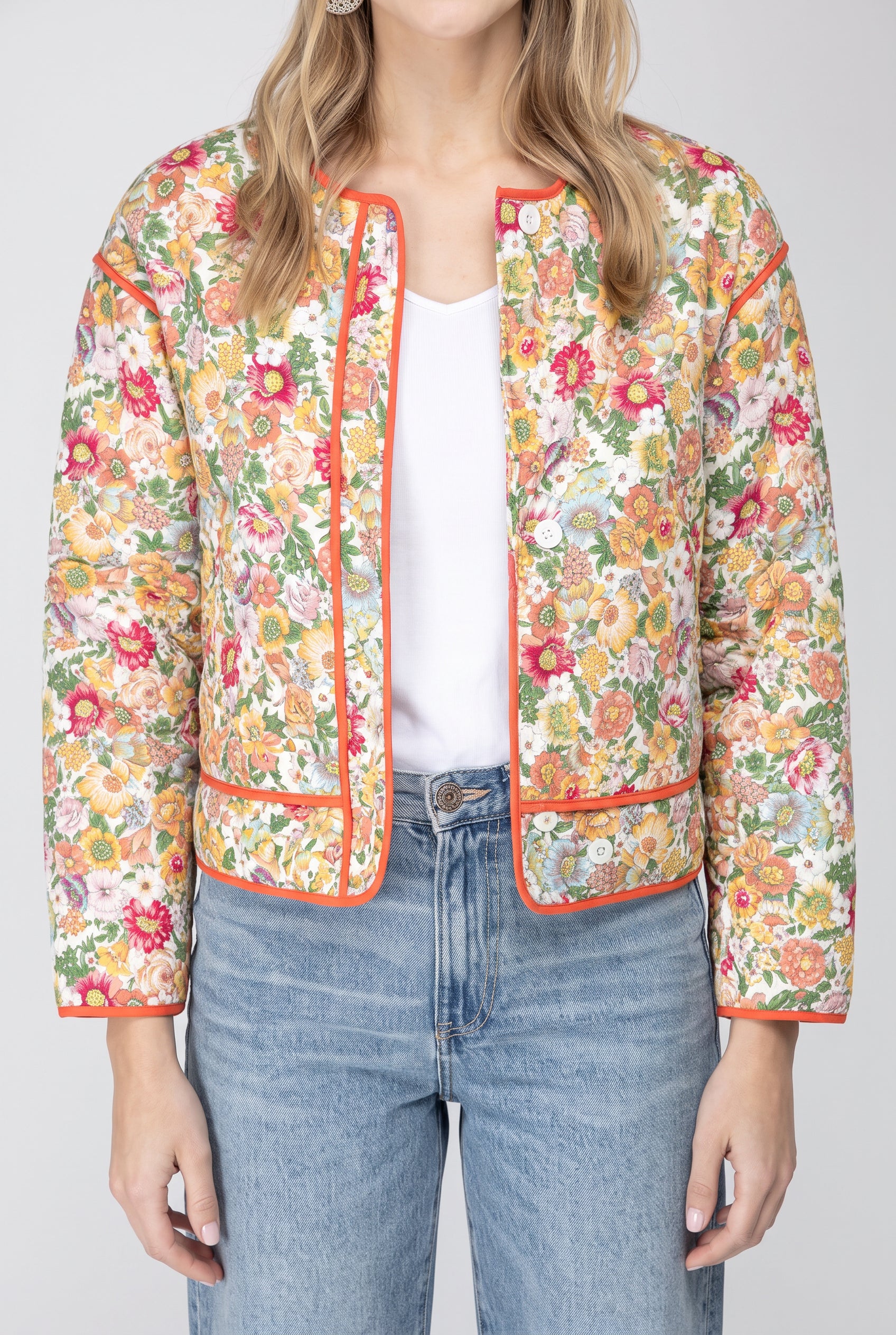 Open front of the Good Feeling Cotton Jacket showing its buttons, orange binding and patch pockets.