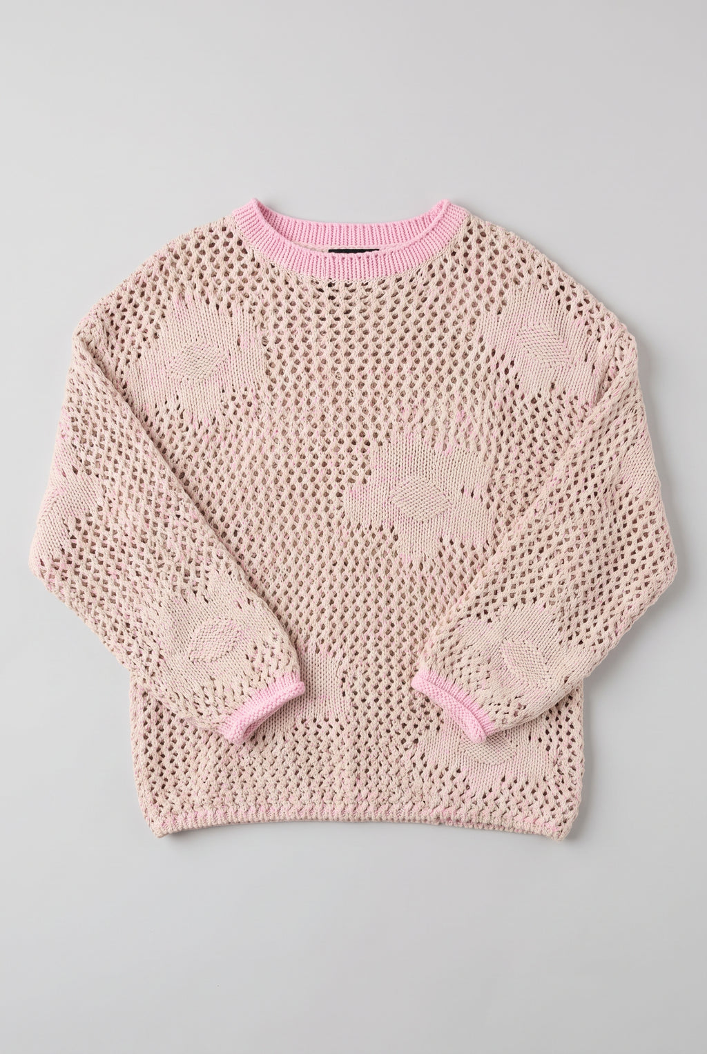 Small/Pink Flower Power Floral Sweater laid flat to show its dropped shoulders, floral motifs and relaxed shape.