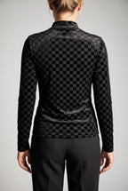 Straight back fit of the Everybody Needs Someone velvet checker top showing the mock neck and untucked hem.
