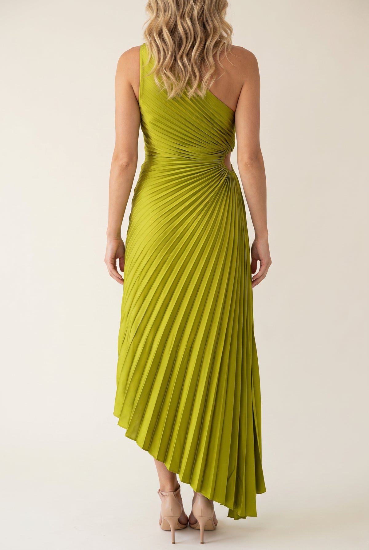 Back fit of the Crazy for You Pleated Maxi Dress showing wrapped pleats and the asymmetric hem.