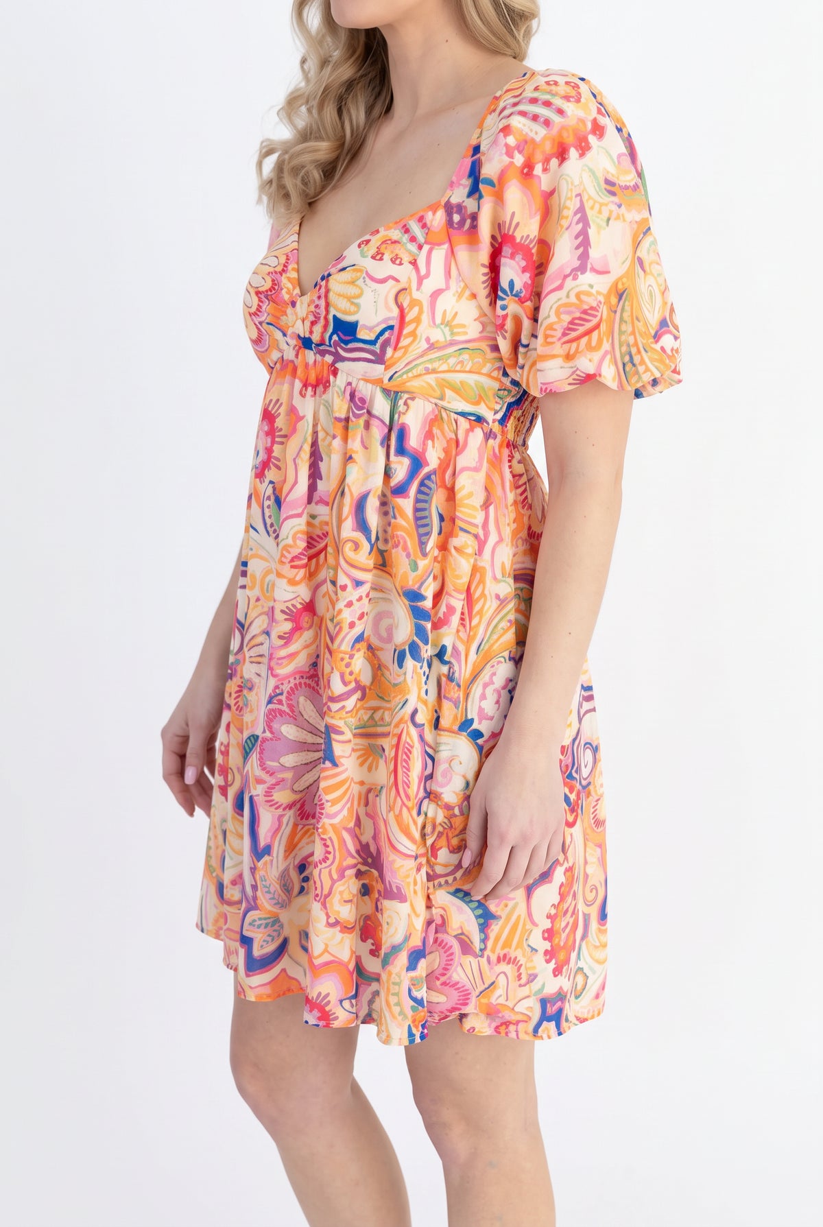 Side fit of the Create Your Sunshine Mini Dress in Small, showing sleeve depth, empire seam and hem balance.