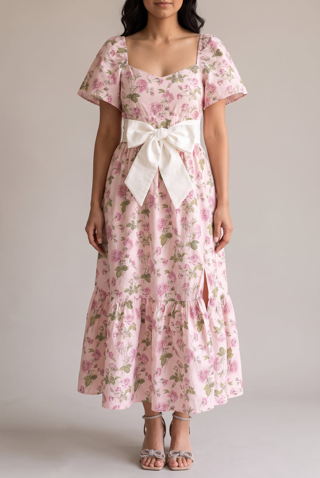 Front fit of the Sending You Love dress in Small, showing flutter sleeves and the ivory bow belt.