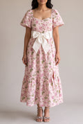 Front fit of the Sending You Love dress in Small, showing flutter sleeves and the ivory bow belt.