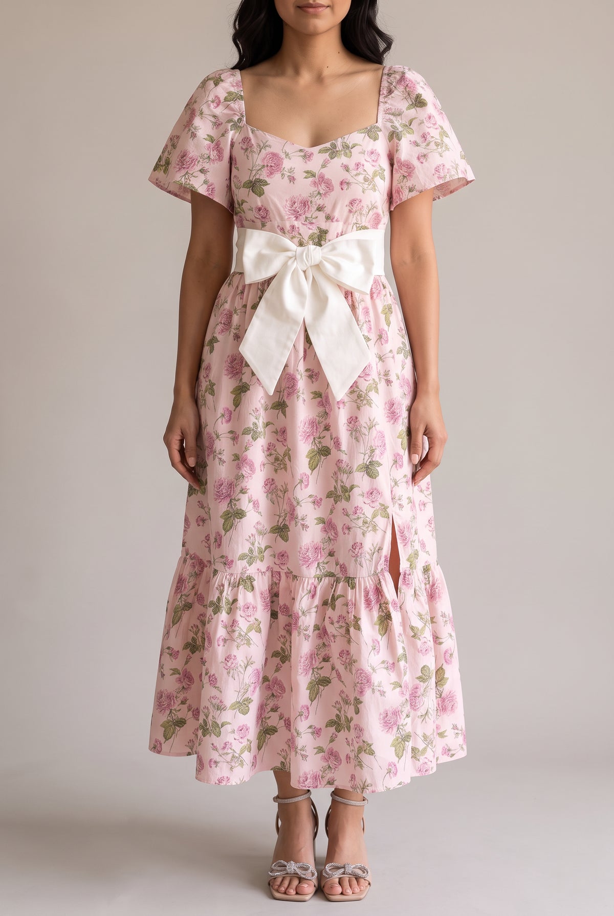 Front fit of the Sending You Love dress in Small, showing flutter sleeves and the ivory bow belt.