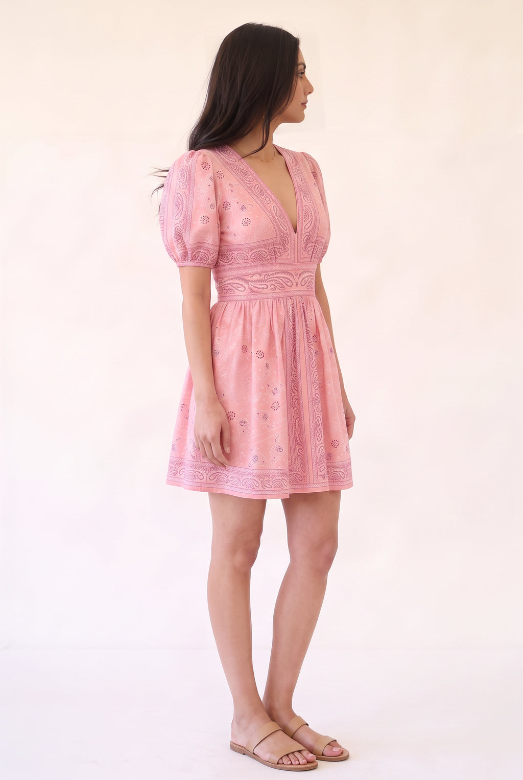Angled side fit of the Forget Me Not Paisley Dress showing puff-sleeve volume and skirt profile.
