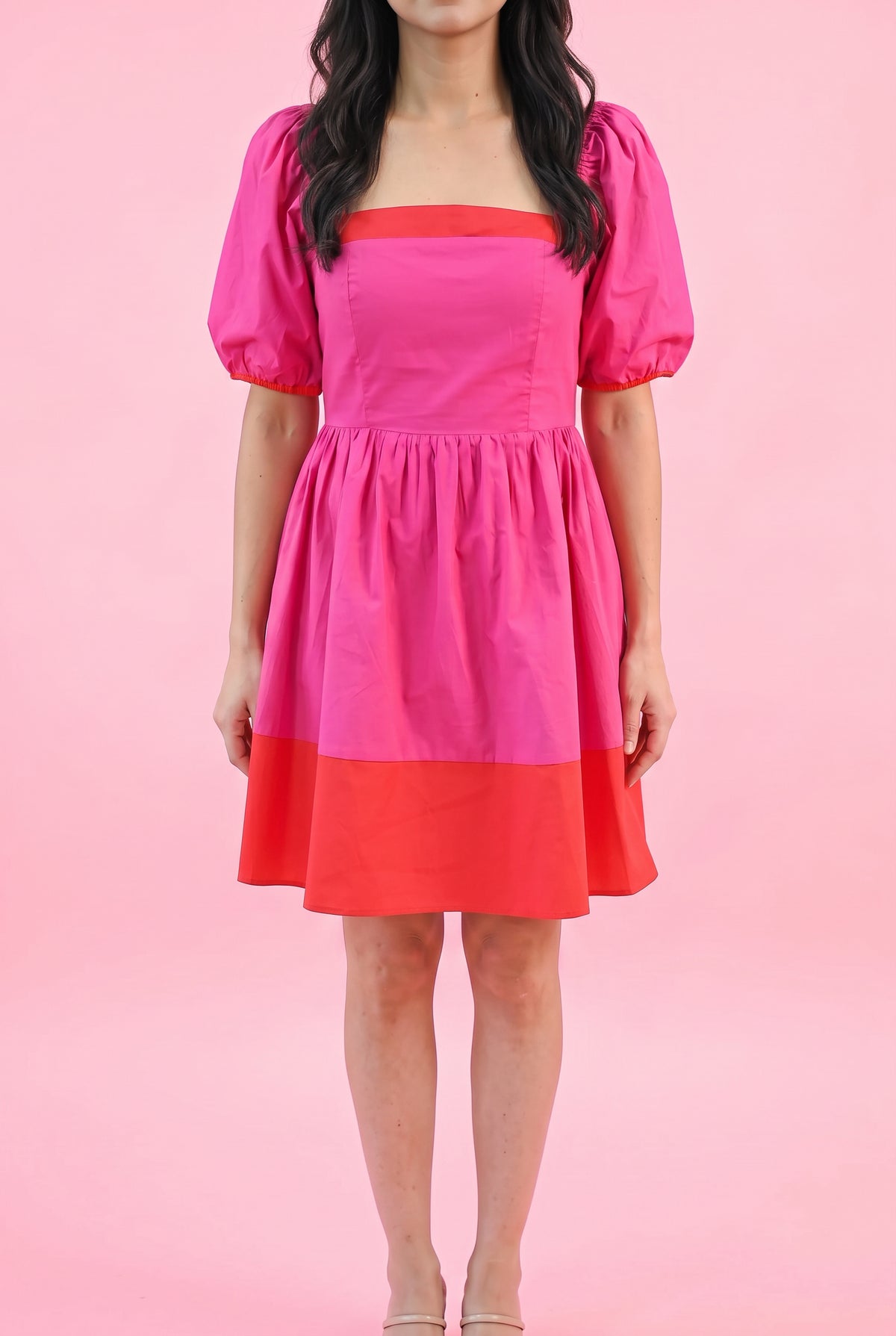 Front fit of the Small Magenta color block dress showing its square neckline and A-line mini shape.