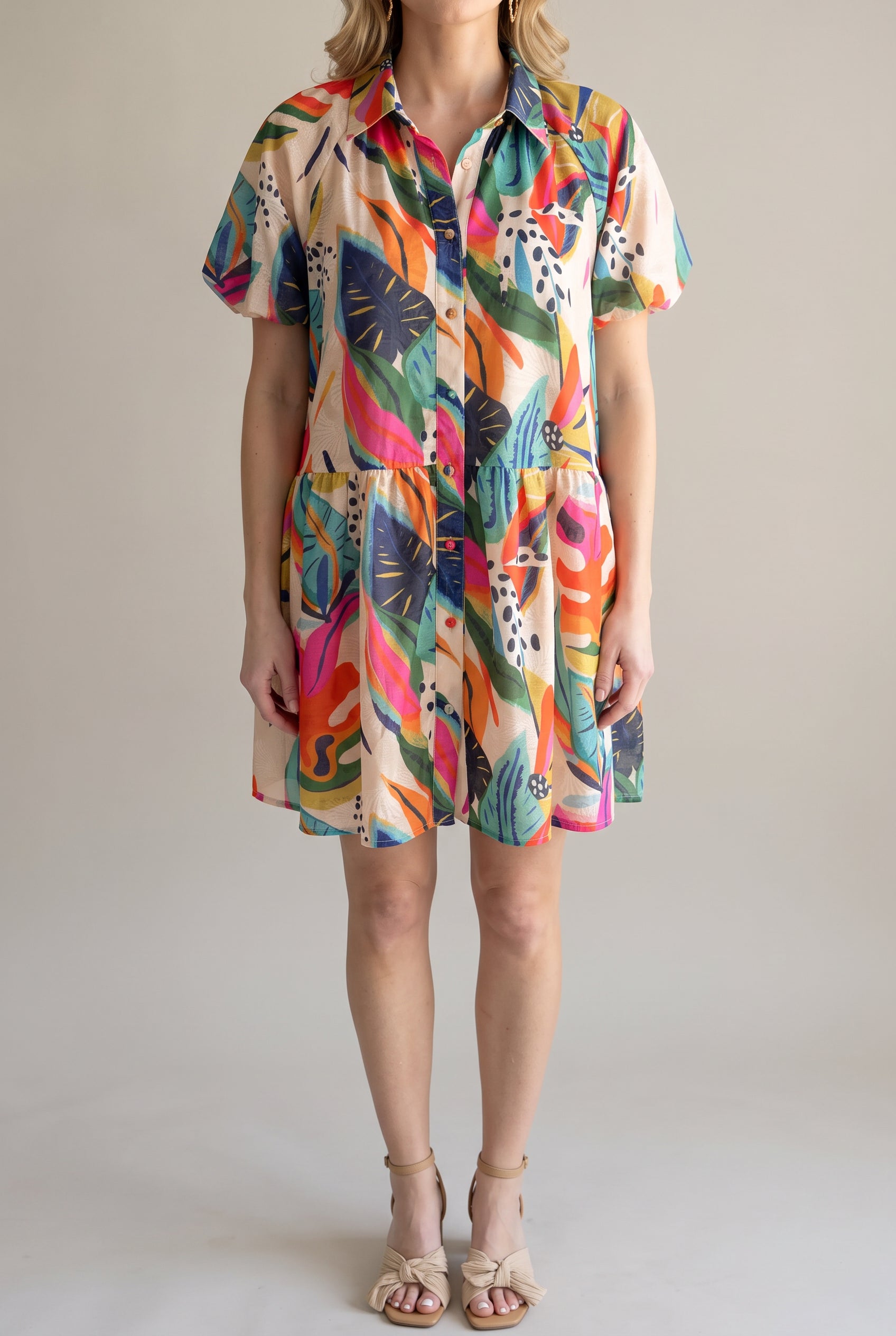 Front fit of the Sunset Swing Tropical Shirt Dress in Small with its relaxed bodice and swing mini skirt.