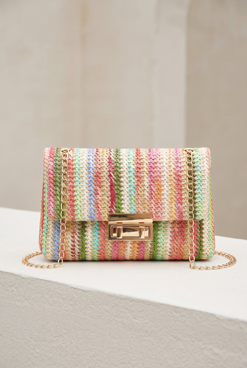 Kinsley Crossbody Bag worn at the hip, showing its compact 10-inch scale.