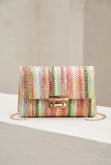 Kinsley Crossbody Bag worn at the hip, showing its compact 10-inch scale.